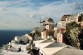 Whitewashed houses and traditional windmill, Santorini island