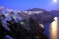 Night falling on the picturesque village of Oia on the north edge of Santorini