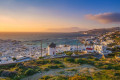 Sunset with a panoramic view to Choram the capital of Mykonos