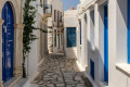 Charming narrow street in Panormos, Tinos