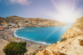 Stunning sunset on the incredible beach of Matala in Crete