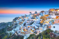 Panoramic view of Fira and Imerovigli at dusk