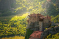 Aerial view of Meteora as the sun rises over the valley