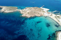 The azure waters of Agathopes beach in Syros