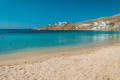 The sandy beach of Ornos in Mykonos is a great place to swim on the Aegean away from swarming crowds