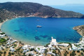 The Azure waters surrounding Vathi village and a view of the Taxiarchis church in Sifnos