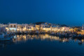 The old port of Naousa as nights sets in Paros
