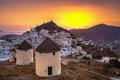 Sunset on Chora, Ios, complete with Cycladic windmills overlooking the event