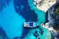Aerial view of teh turquoise waters in Tsigrado, Milos