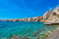 Turquoise waters on a beach in Syros