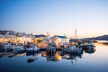 Sunset on a charming port in Naoussa, Paros