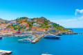 Aerial view of the port of Hydra on a bright summer day