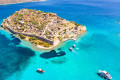 Aerial view of Spinalonga and the azure waters surrounding it