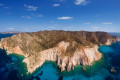 The rocky coast of Polyaigos (translating into many goat island)