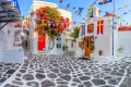 Charming Mykonian sqare with a beautifully decorated church