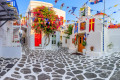 Charming square featuring a wonderfully decorated church in Chora, Mykonos