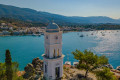 the iconic Clock Tower in the Poros waterfront