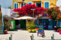 Quaint square in the town of Adamas, Milos