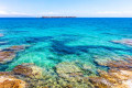 Azure waters on Chrisi Akti beach, a jewel of Paros