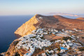 Aerial view of Chora in Folegandros as the sun goes down in the Aegean Sea