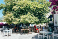Kafeneion in a square in Panormos, Tinos