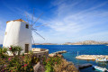 Cycladic windmills overlooking the Aegean Sea in Paroikia