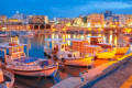 The Heraklion port is beautifully illuminated as the night falls