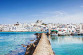 Wave crasher on the port of Paros