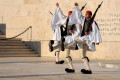 Evzones dressed in traditional Greek uniform changing the guard at the Greek Parliament Building in front of Syntagma Square, Athens