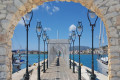 Narrow pathway laid with lanterns in the main port of Zakynthos