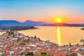 Sunset on the town of Poros with a view to the Saronic Gulf