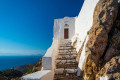 Entrance to the Prophet Elias Monastery in Patmos, next to a rocky cliff