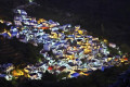 Koronos village lights up during the night