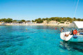 The crystal clear sea of Moni Beach in Aegina