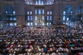 Muslim Friday prayer in the famous Blue Mosque in Istanbul, Turkey