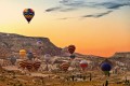 Air ballons floating over Cappadocia at sunset, Turkey