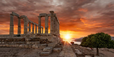 Sunset in the Temple of Poseidon at the edge of Cape Sounion