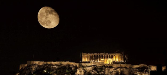 A stunning moon looming over the Acropolis