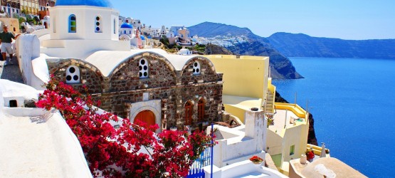 Candy colored houses and the exotic caldera, Santorini island
